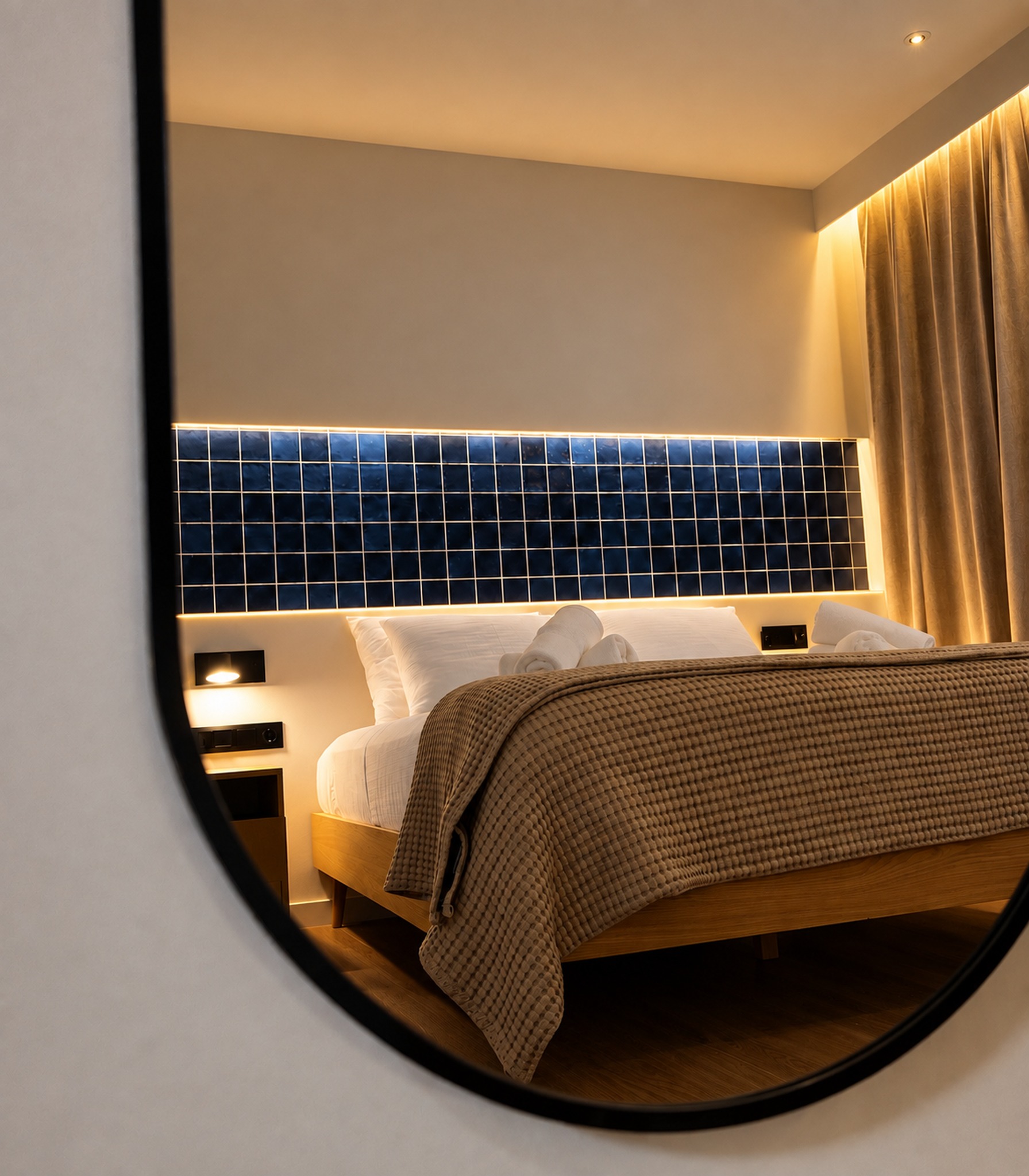 Aetheria Resort room reflected in mirror