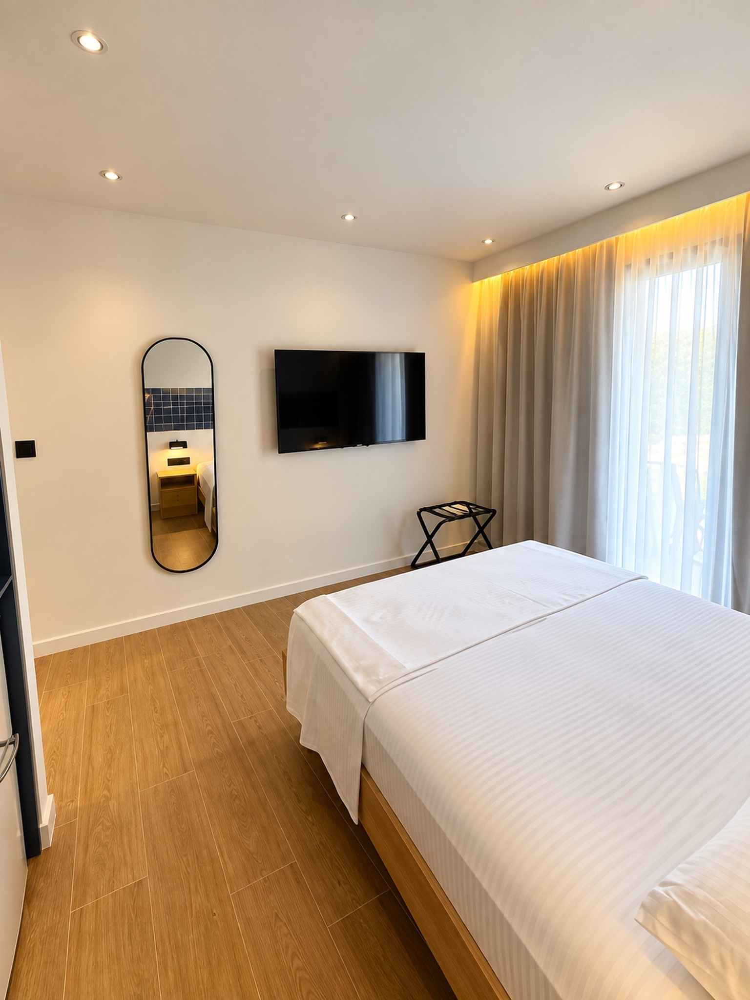 Aetheria Resort suite with TV